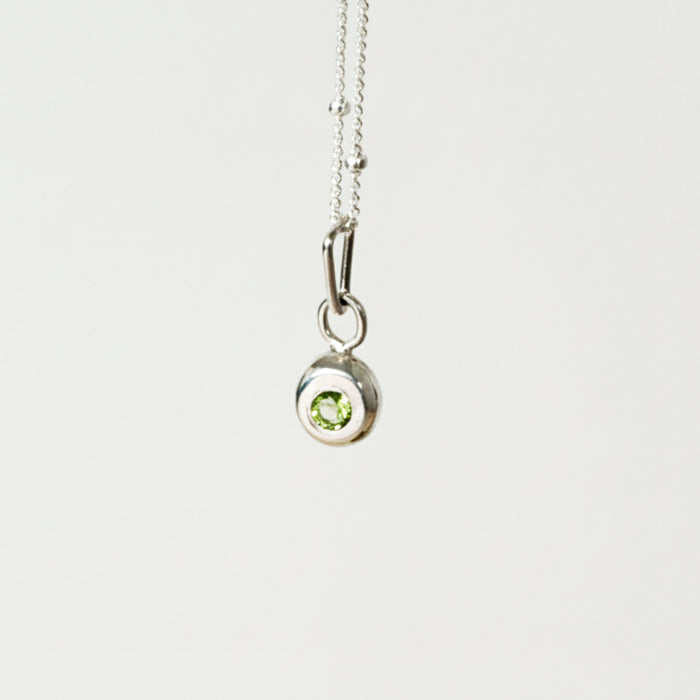 Rise Peridot Charm